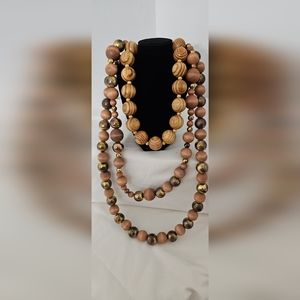 Ebony 3 layered, detachable, wooden beaded necklace with gold dwtail